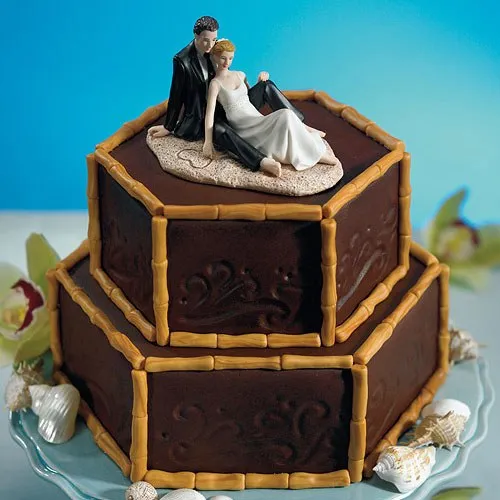 Bride and Groom Sitting on Beach Sand Wedding Cake Topper
