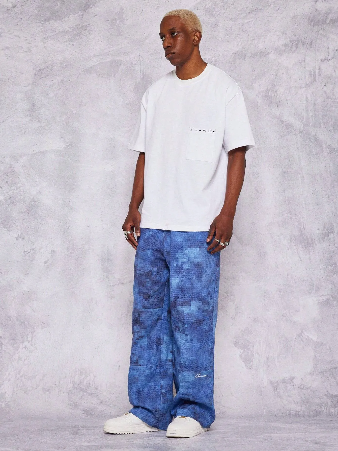 SUMWON Loose Fit Baggy Jeans With All Over Print