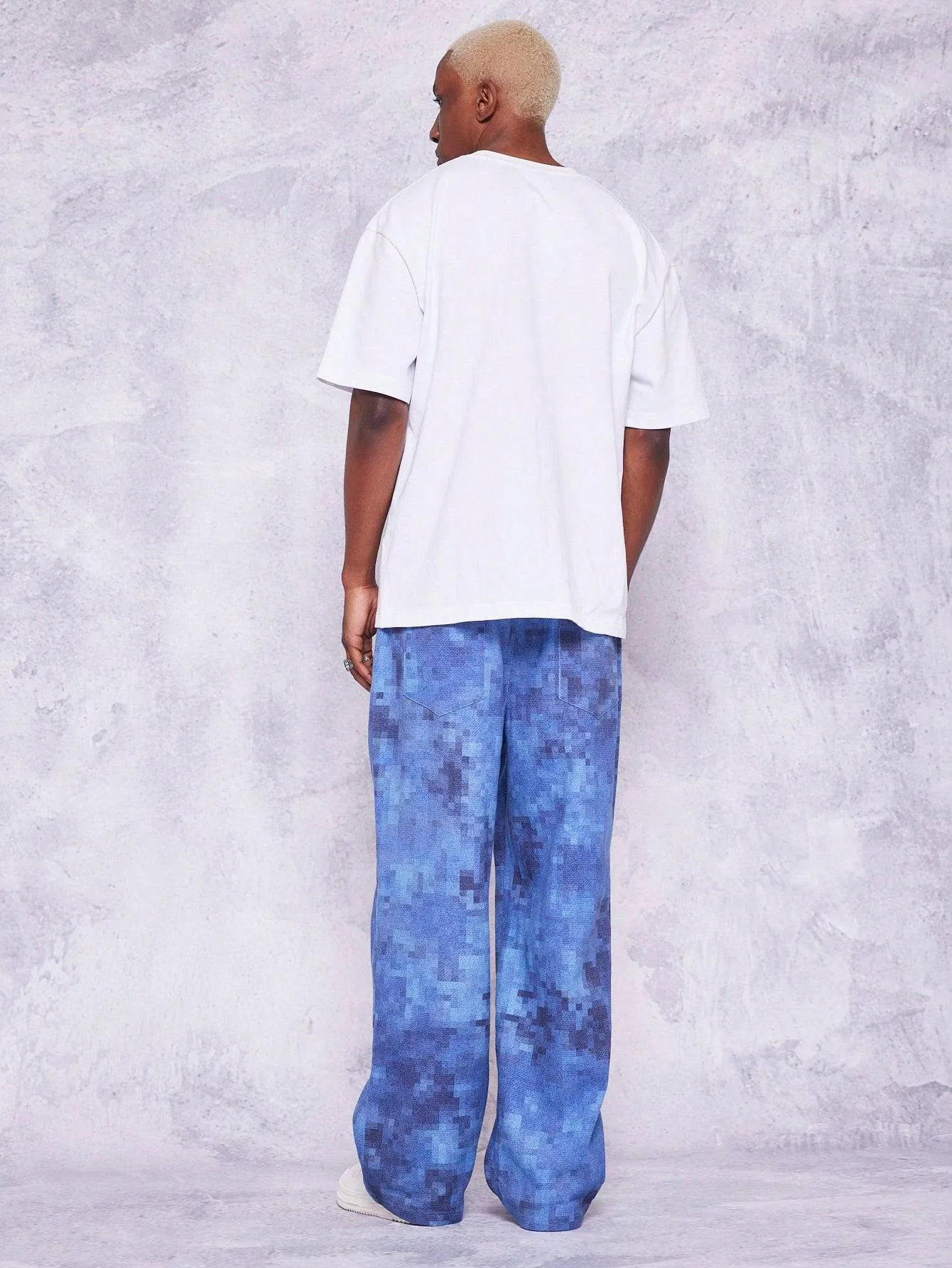 SUMWON Loose Fit Baggy Jeans With All Over Print